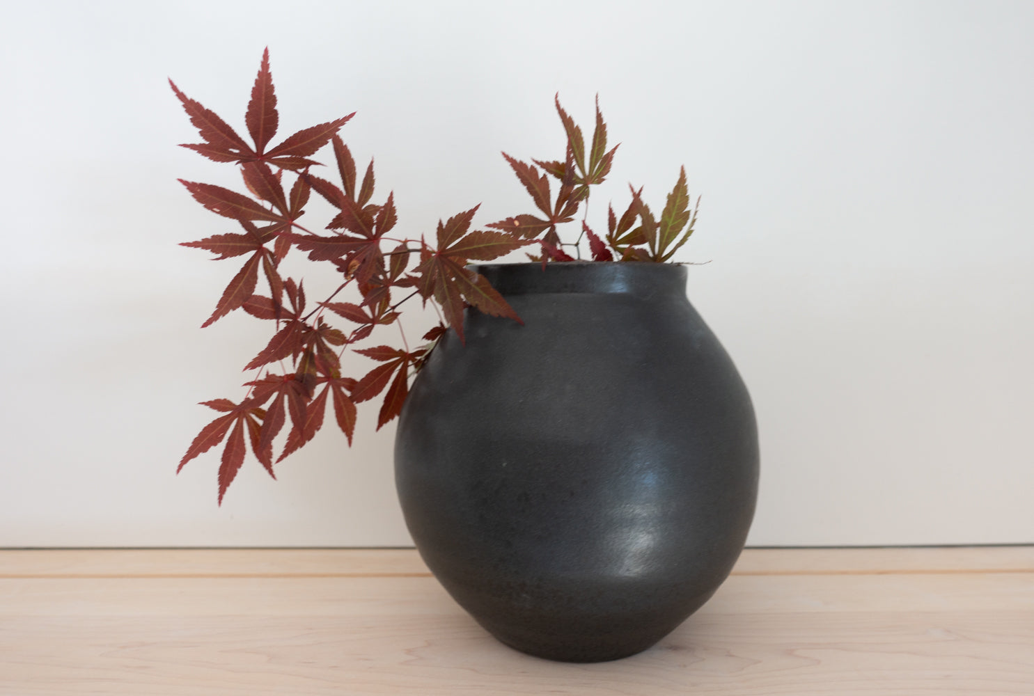 Stoneware black moon jar