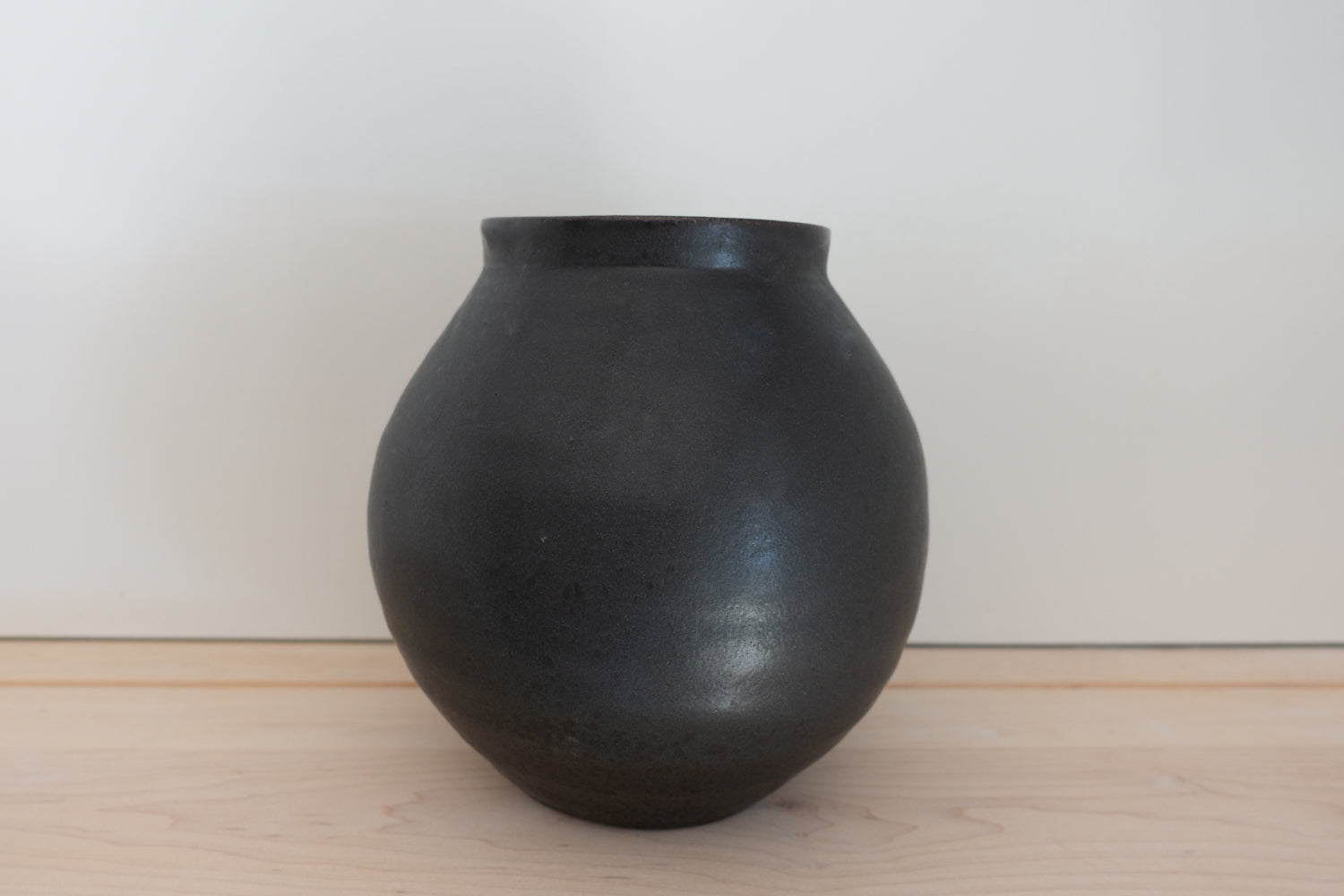 Stoneware black moon jar