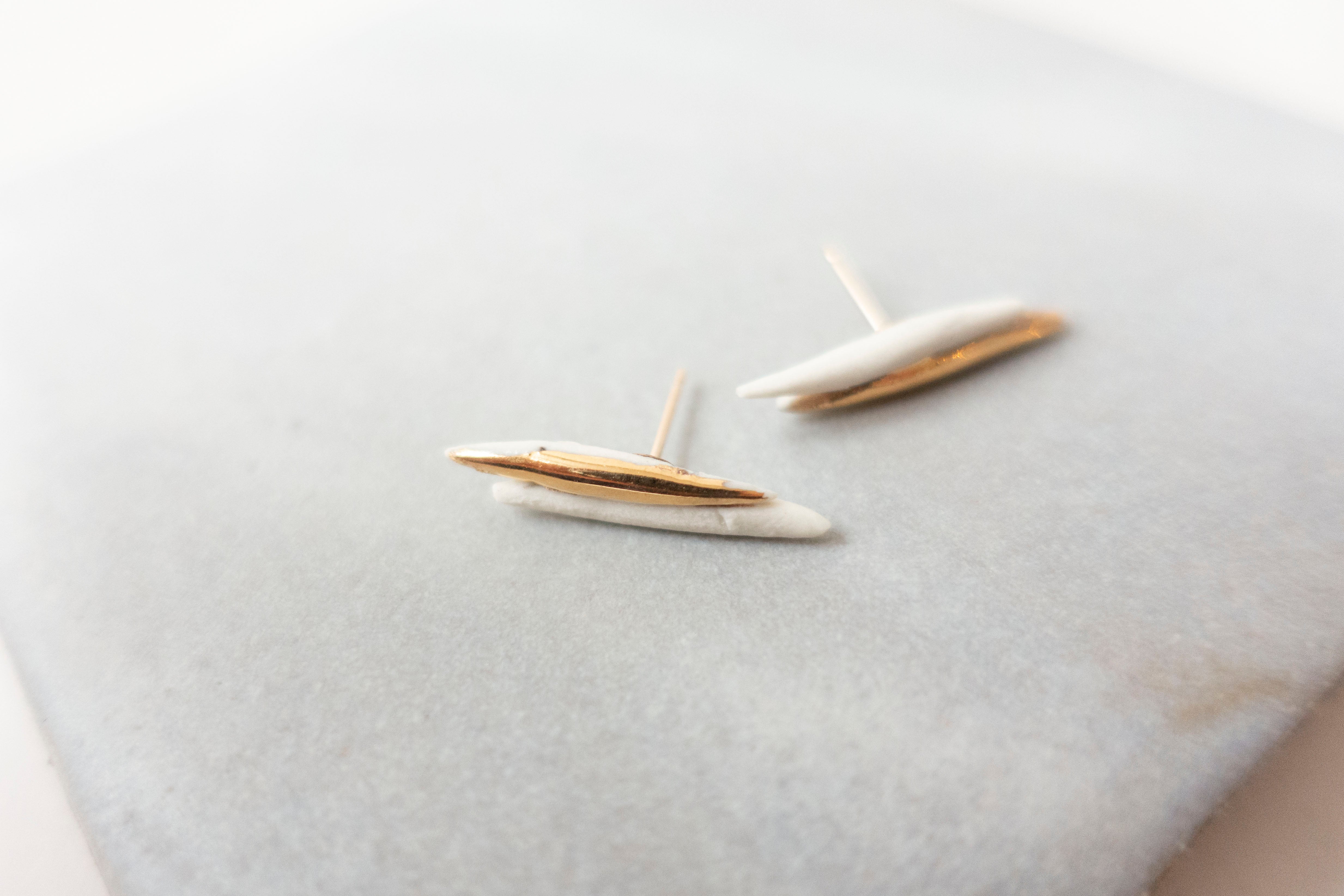 Twin quills white earrings