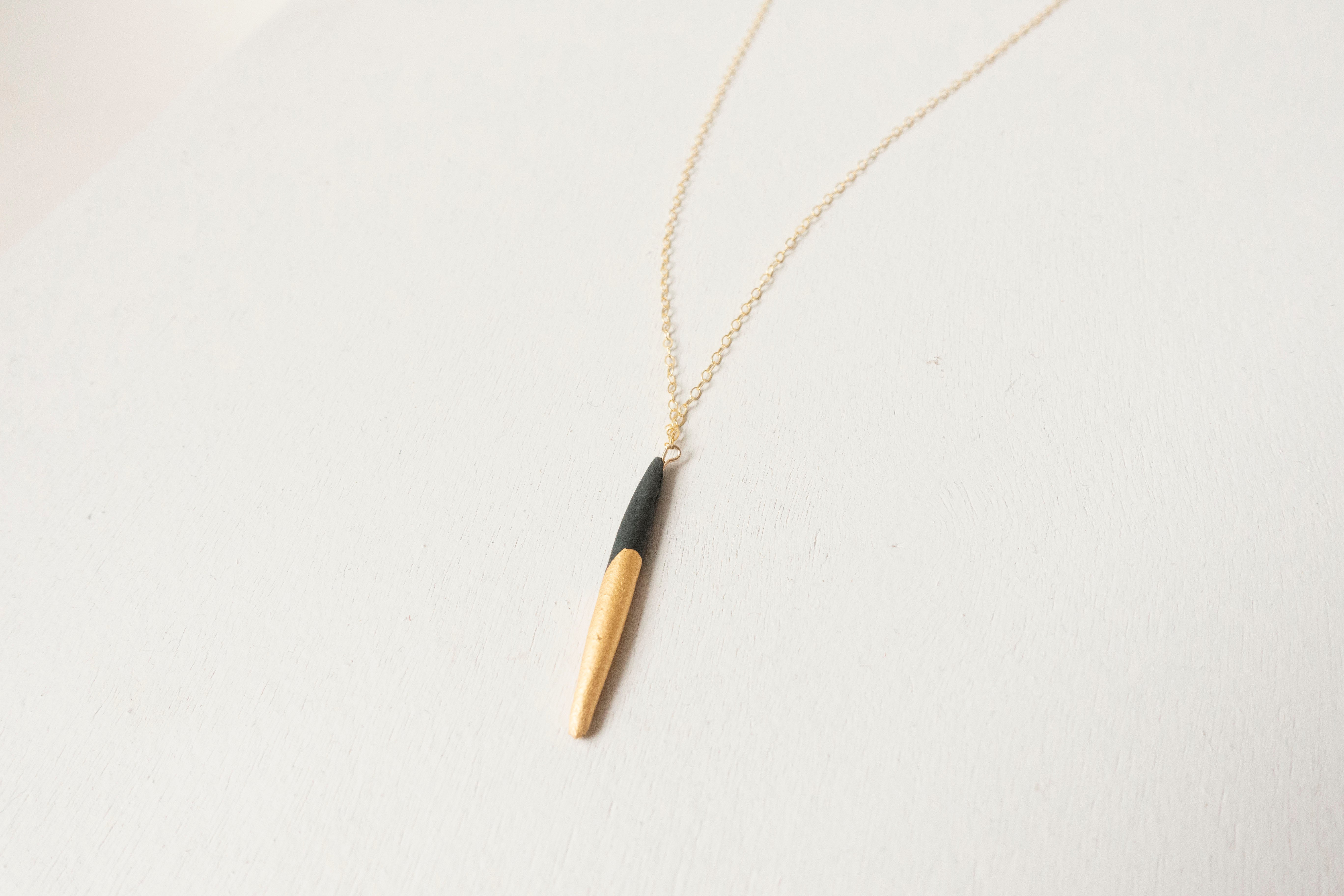 Single quill necklace black & gold