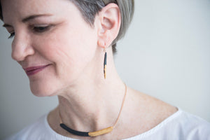 Quill Earrings black with gold dipped tip